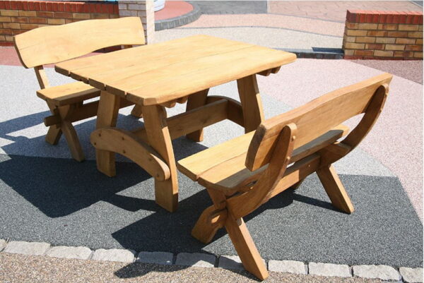 oak table set. comes with two benches. Bespoke outdoor furniture from solid oak