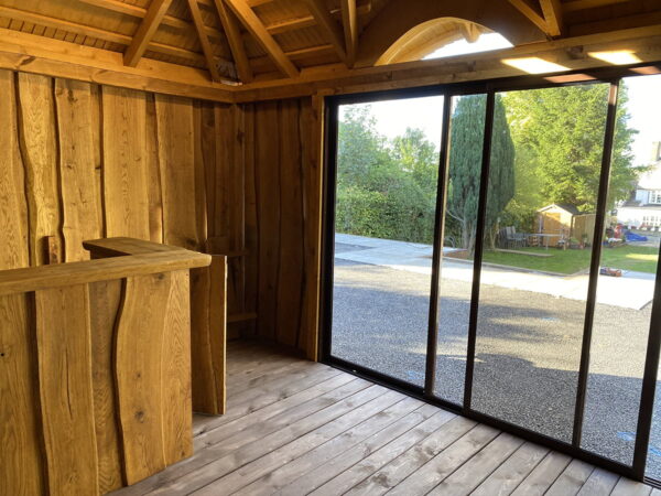 Bespoke bar featuring sliding glass doors